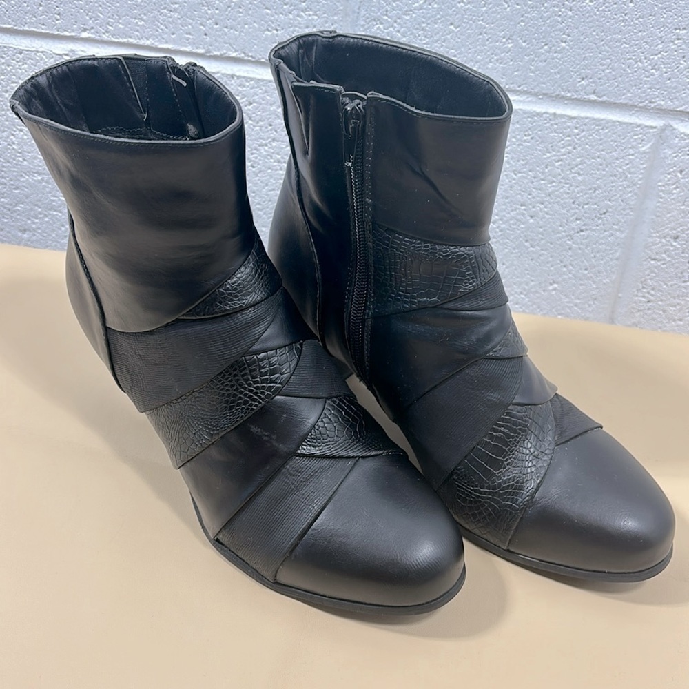 Wanderlust black leather and animal print boots​​​​​​​​​